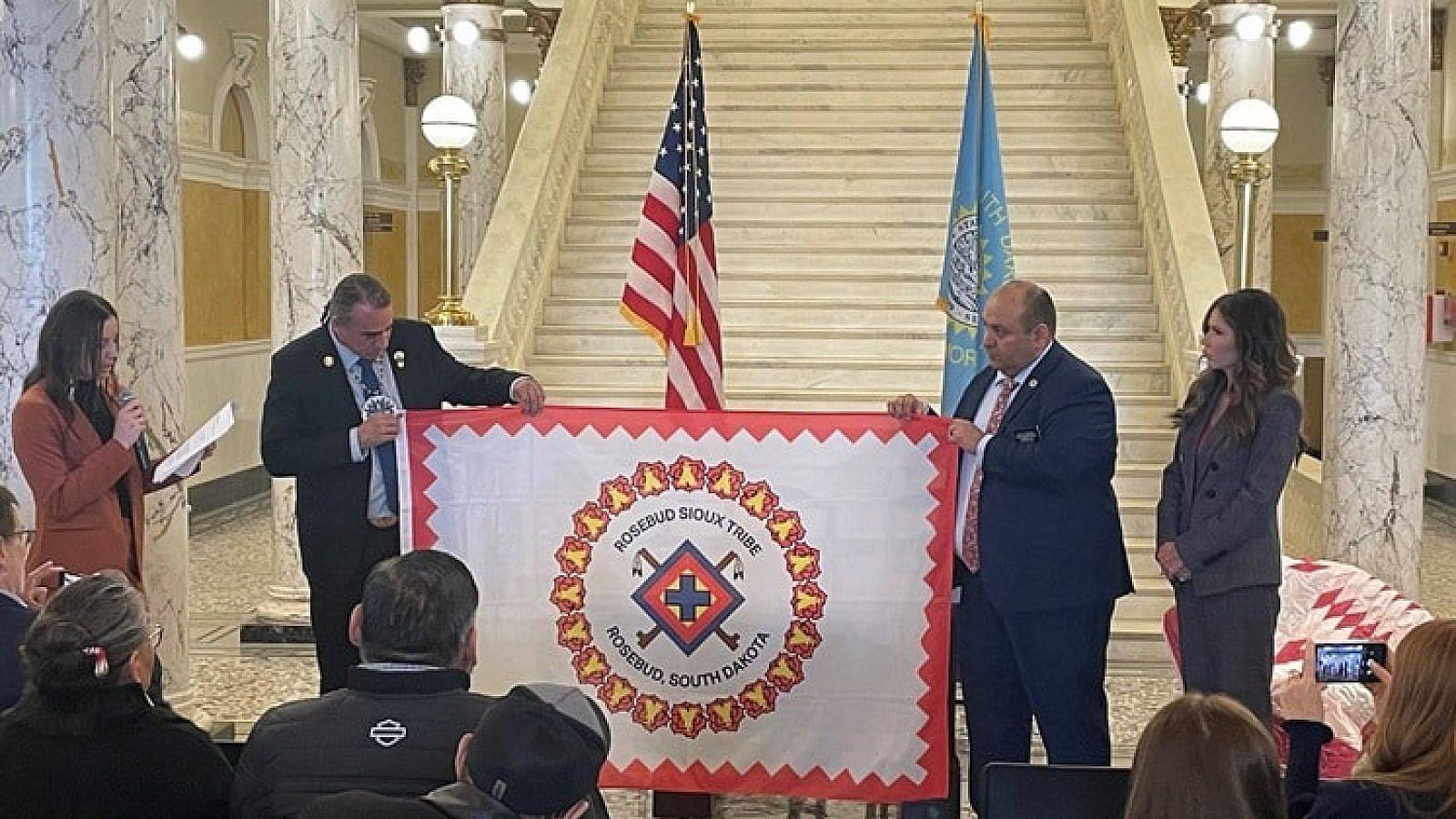 Native American tribal flag displayed at state capitol building