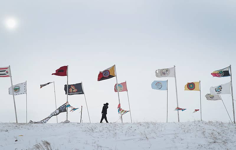 U.S. Native American tribal flags on display.