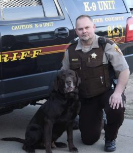 Police deputy with police dog