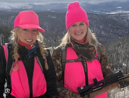 women hunters wearing pink