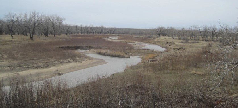 A polluted river in the countryside.