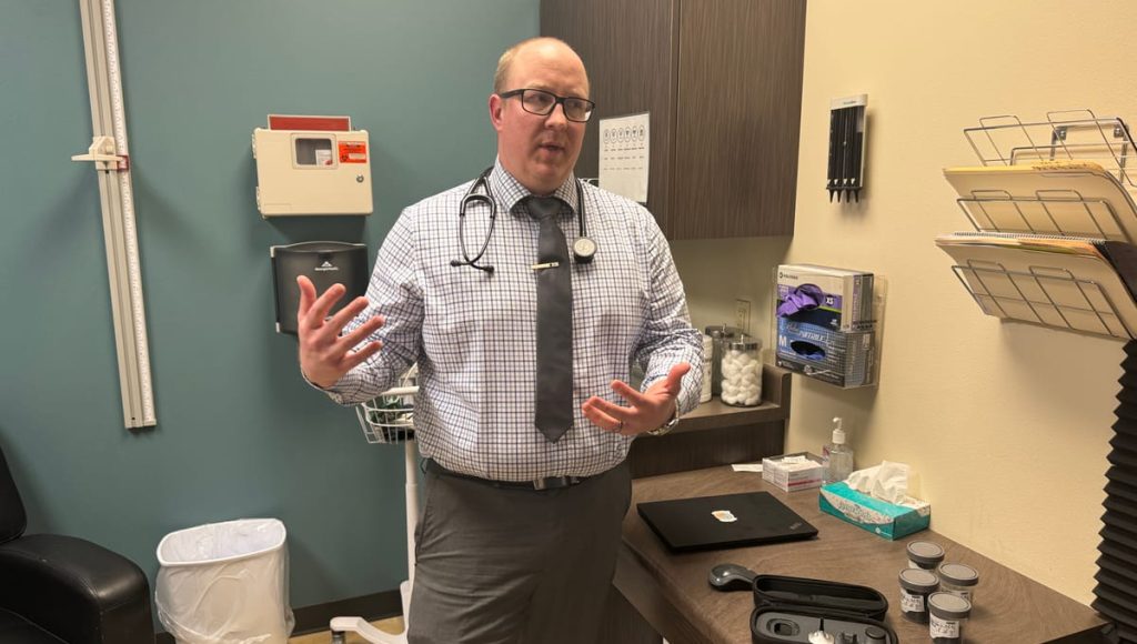 A physician assistant in an examination room.