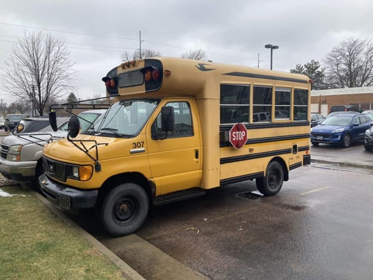 A school bus parked in a parking lot.