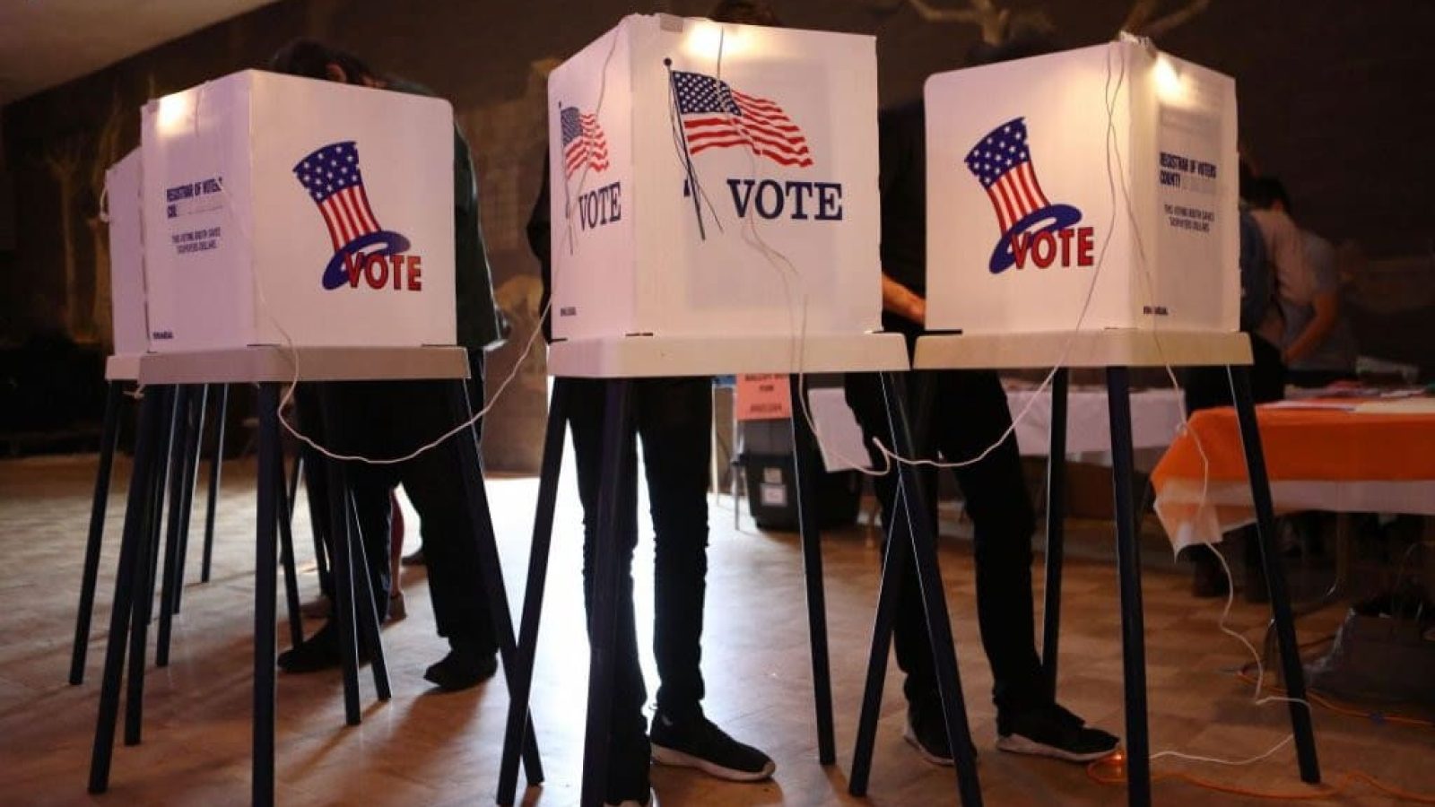 Voters in voting booth